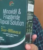 hims minoxidil finasteride spray review